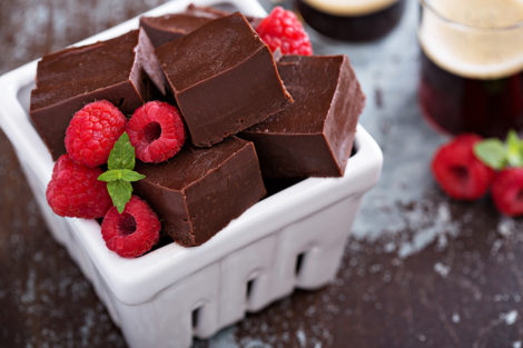 Chocolate fudge pieces with raspberries best for holiday or a hot summery day