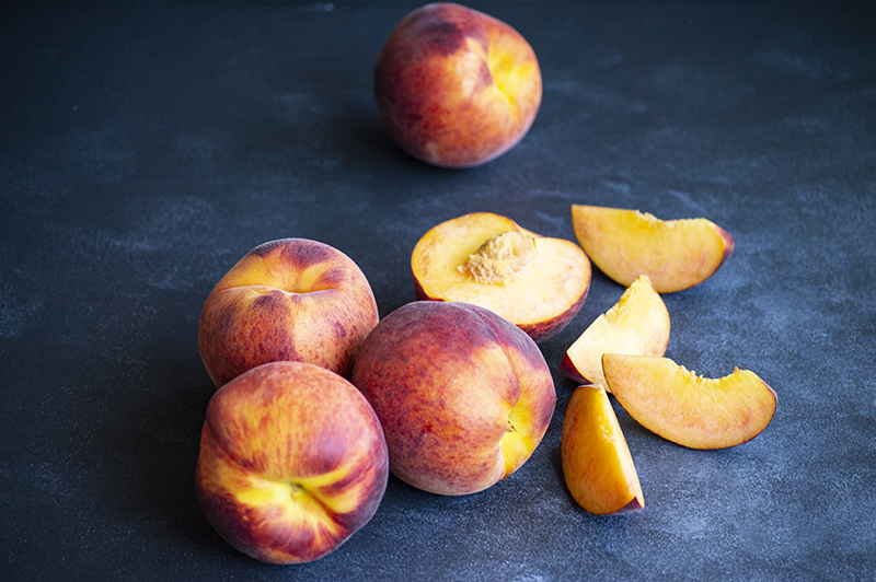 whole peaches and sliced in wedges